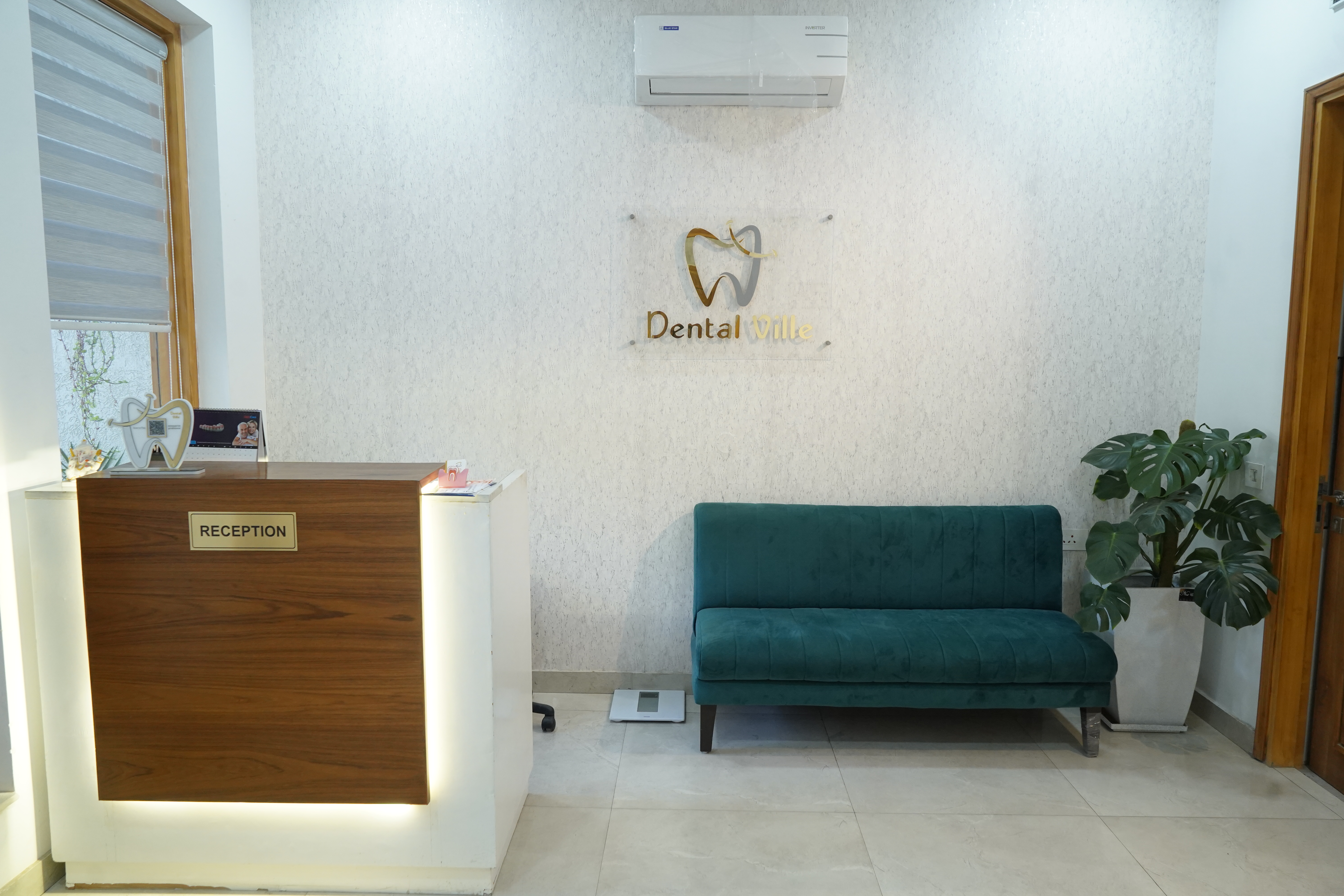 Dental Ville reception desk and seating area