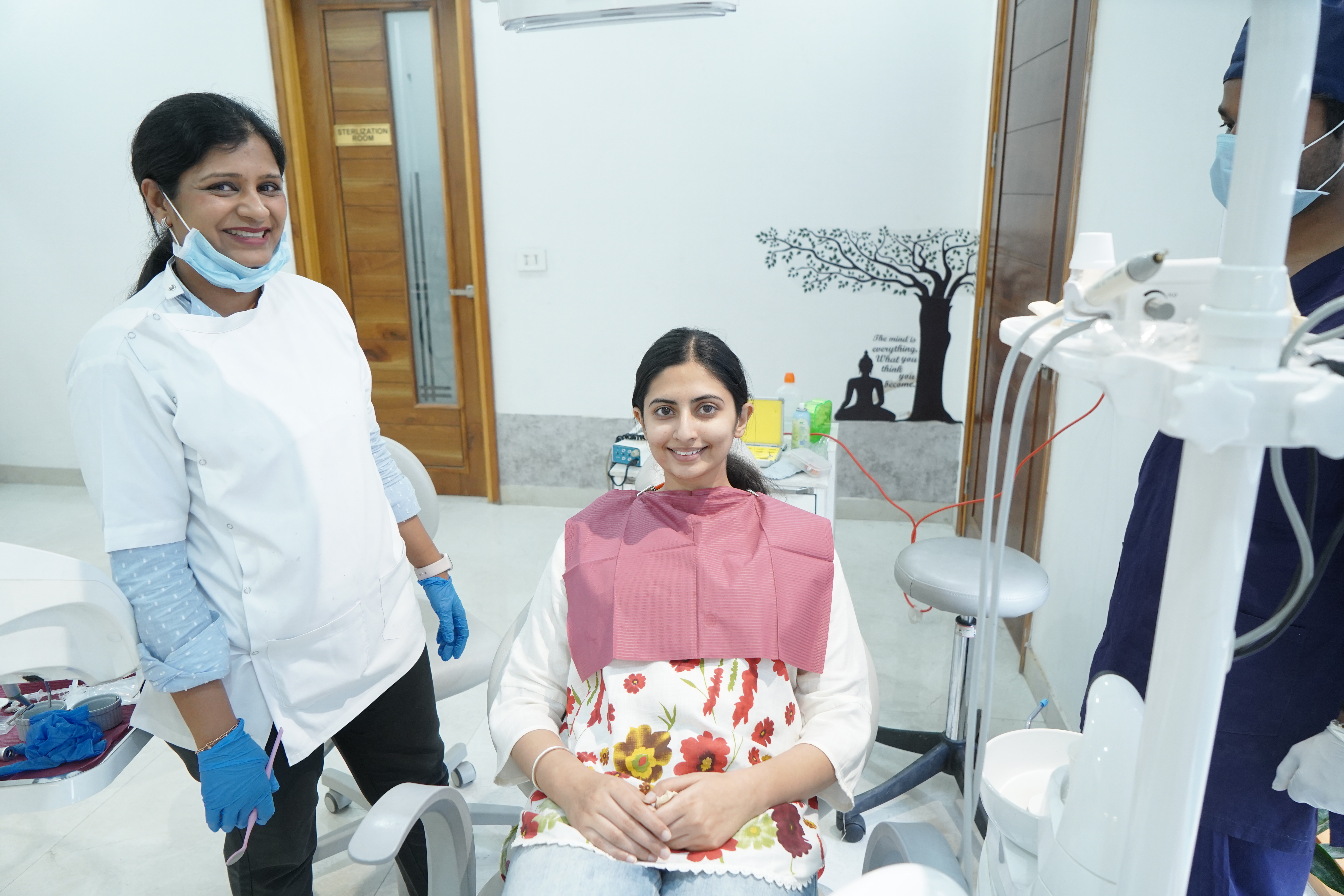Indian female dentist checking an Indian patient at Dental Ville